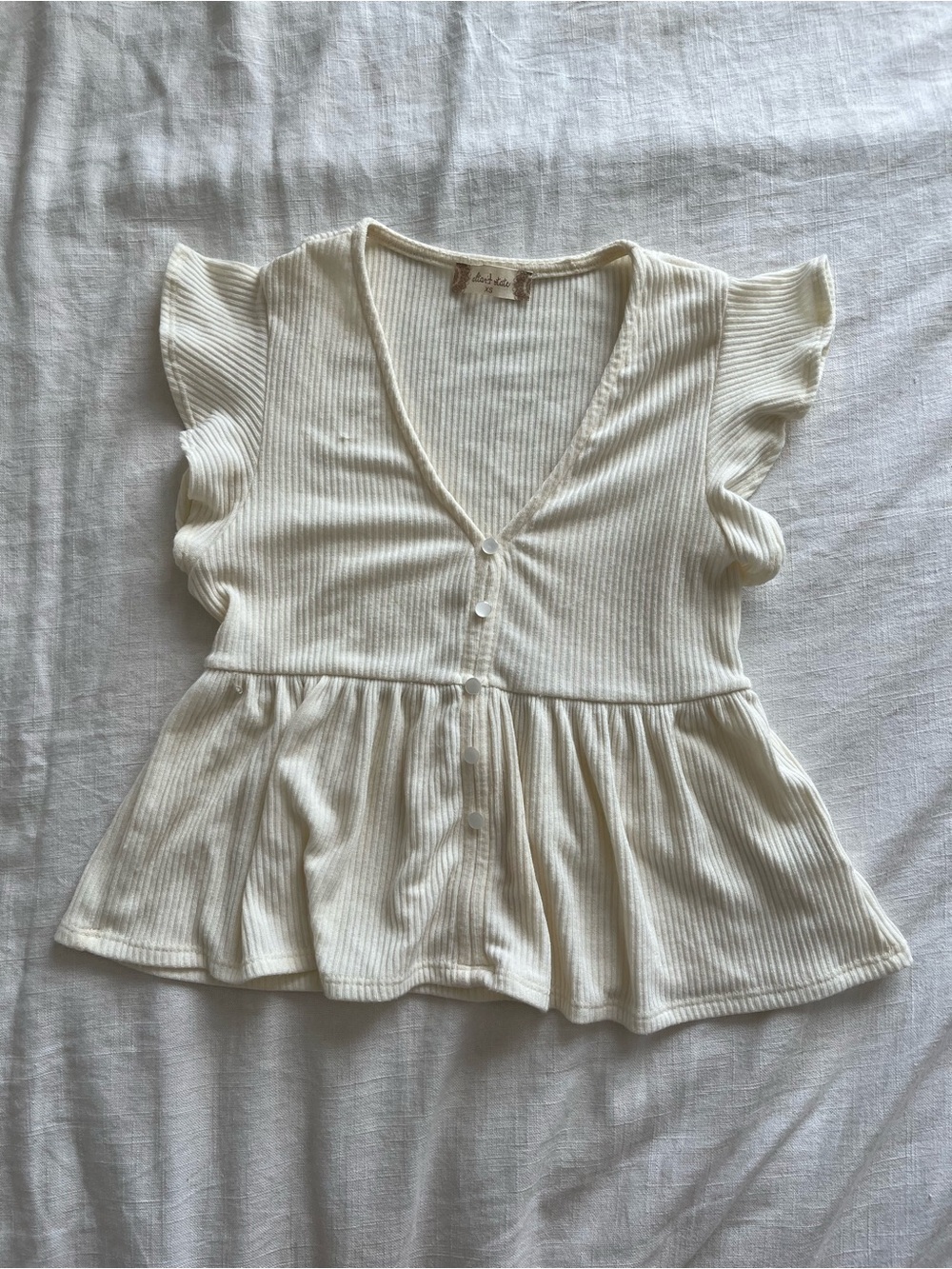 Altar’s State Cream Ribbed Button Peplum Top